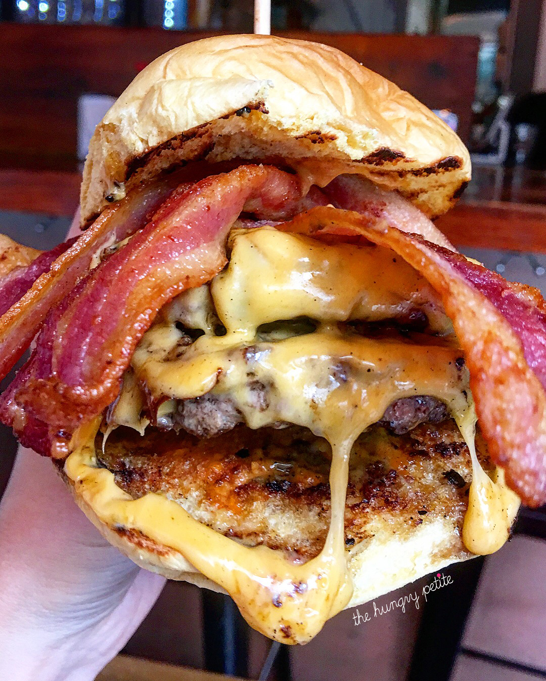 His double Mighty Bacon burger