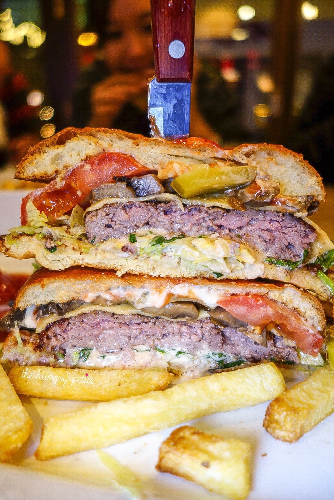 Free range premium aged Angus US beef burger with mushrooms and cheese