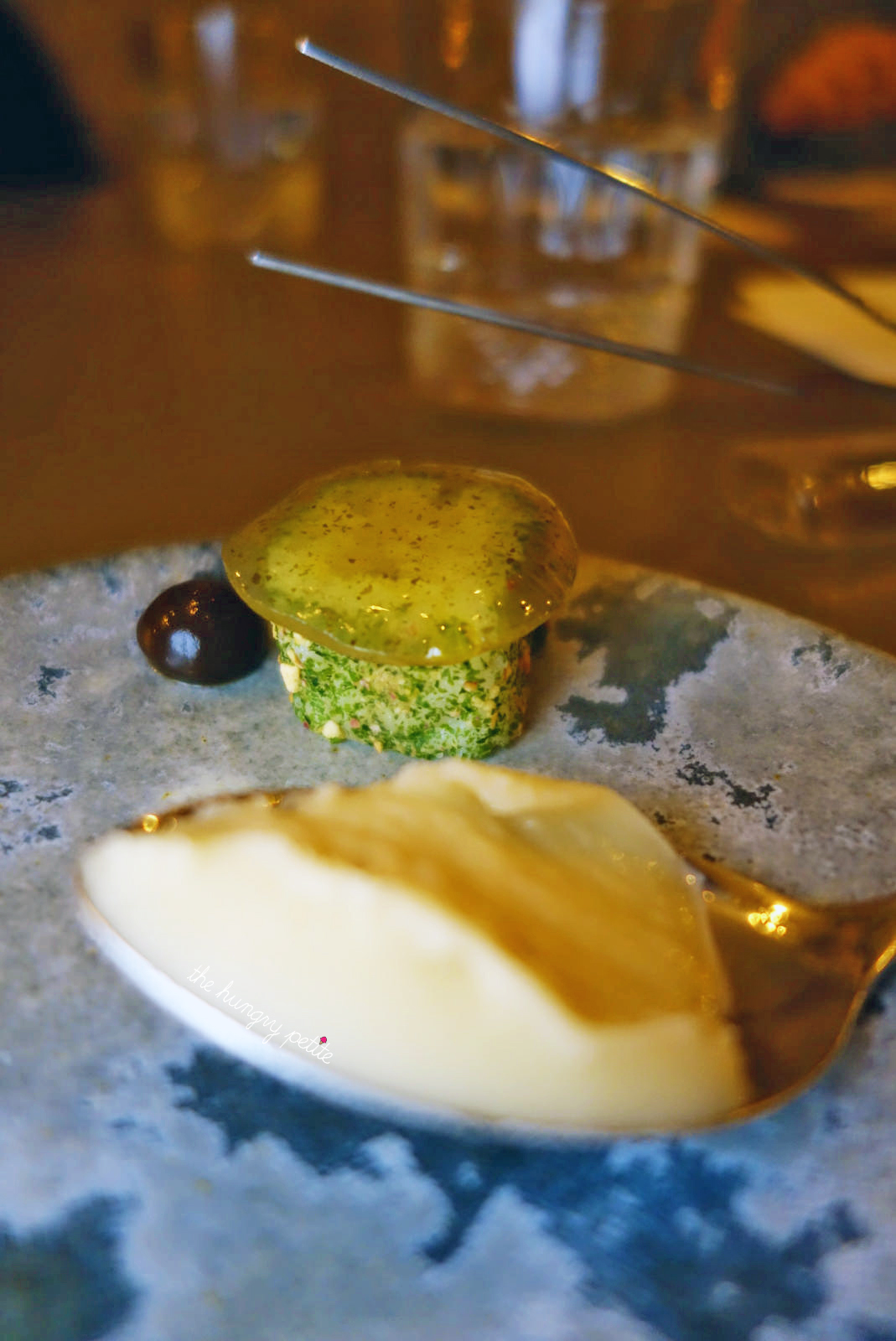 Palate cleanser: Wim Bijma Seaweed. Sushi roll with flavors of apple, seaweed, fermented black garlic, and an apple cider sorbet