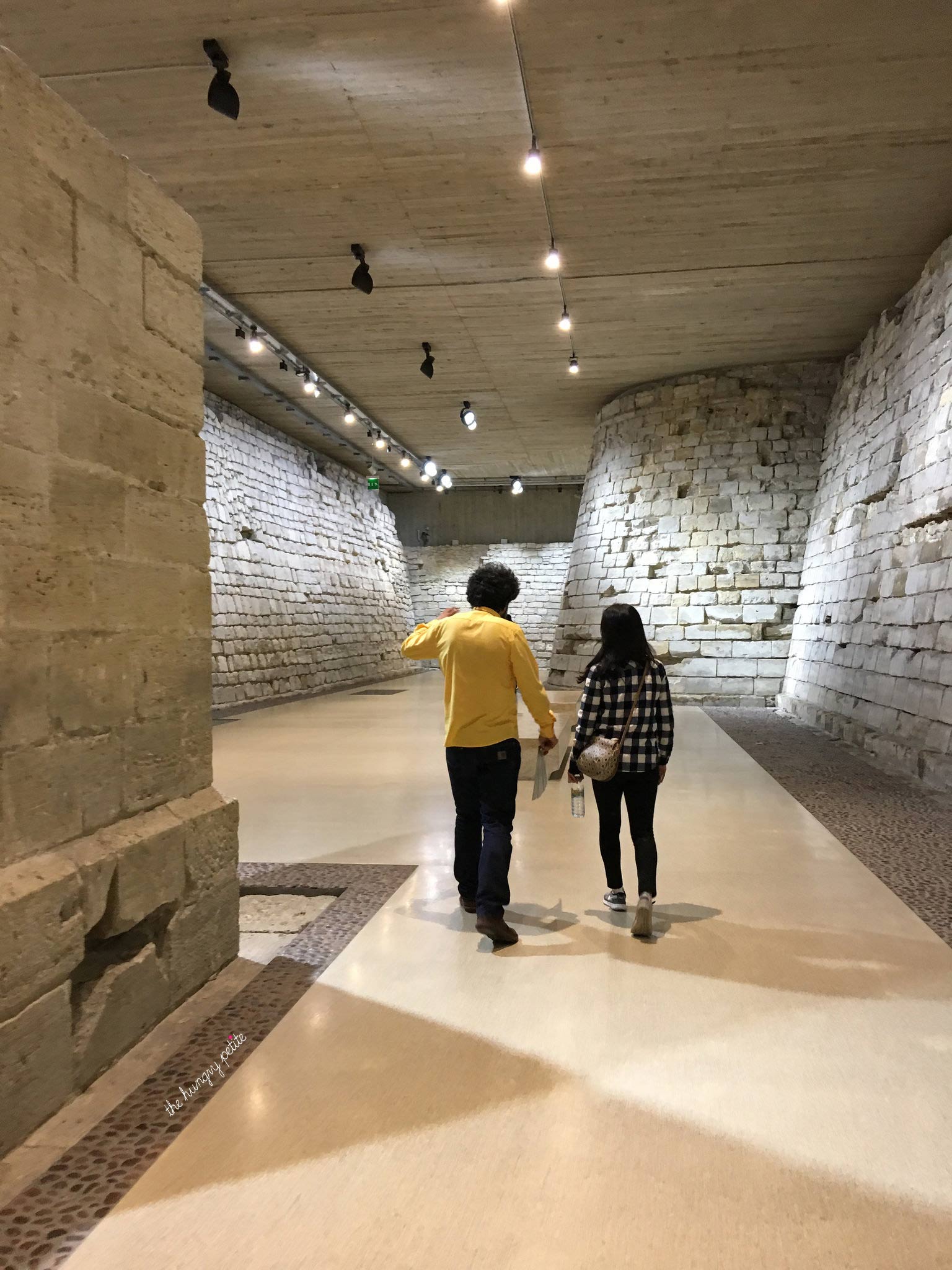 Our tour guide walking us through where the moat of the fortress was