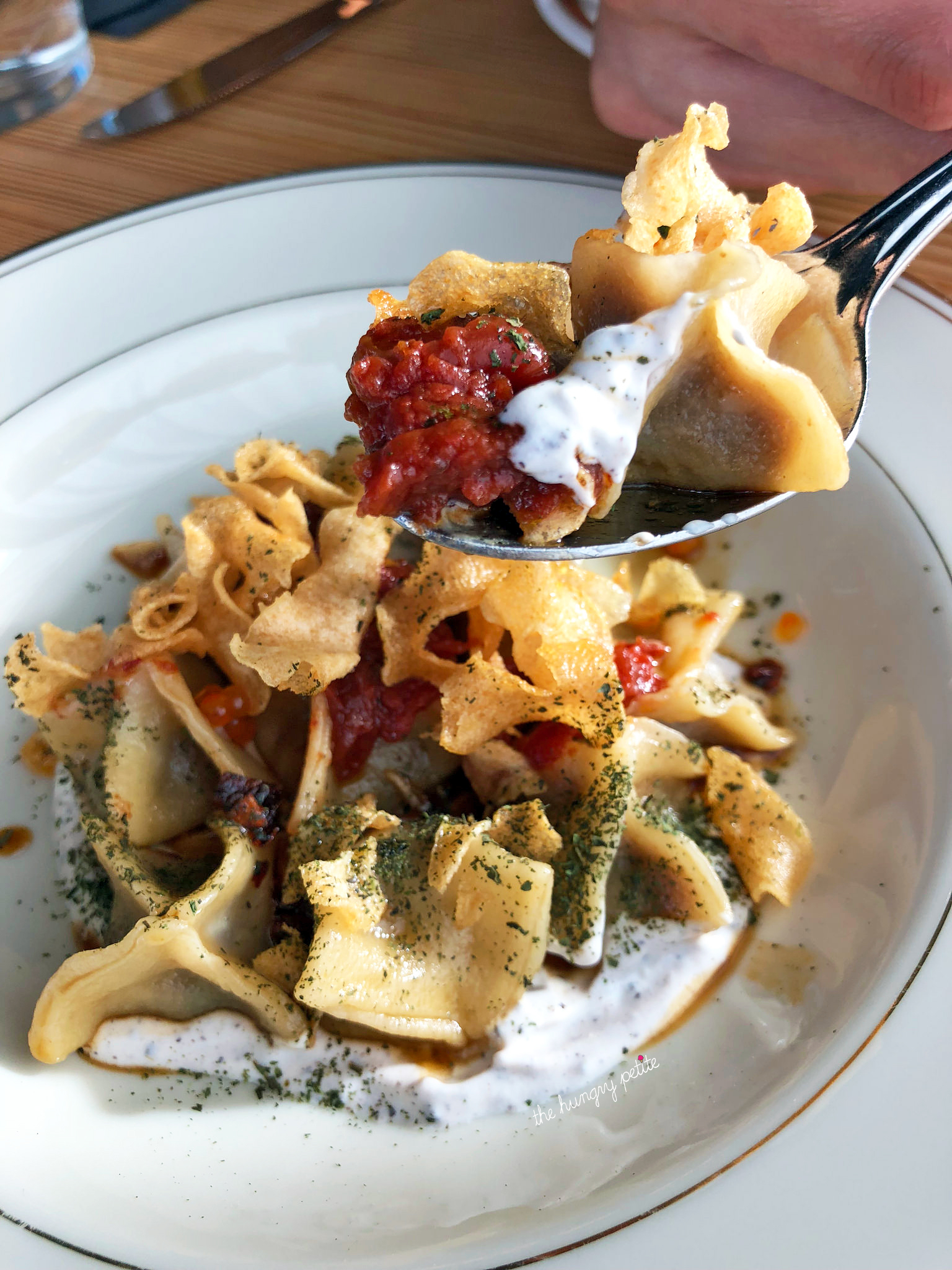 Turkish dumplings with spicy tomato vinaigrette, labneh, and lamb jus. We fought over who'd finish the last dumpling.