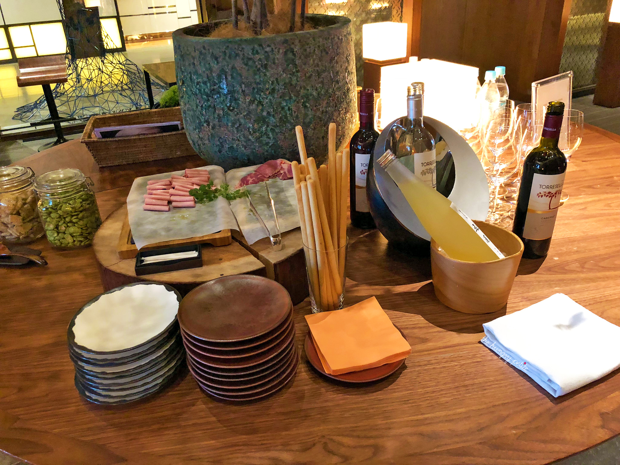 During happy hour, the hotel lobby had an assortment of drinks and snacks every night.