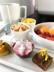 Nut, raisin and chocolate square, fruits of the forest compote, apricot and pistachio financier cake, ice creams and sorbets, fruit salad
