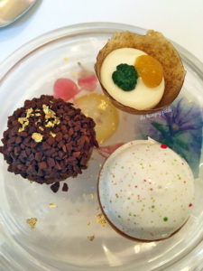 Pre-dessert palate cleansers: raspberry meringue tart, tarragon passion fruit tart, chocolate tart