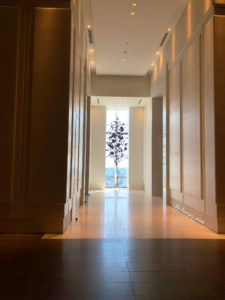 From the lobby you can see this little tree, and as you get closer you see a stunning view of Tokyo and the Tokyo Tower.